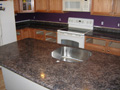 Stainless undermount sink in laminate.