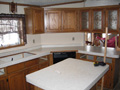 2 After - Countertop replacement w/ laminate on walls.